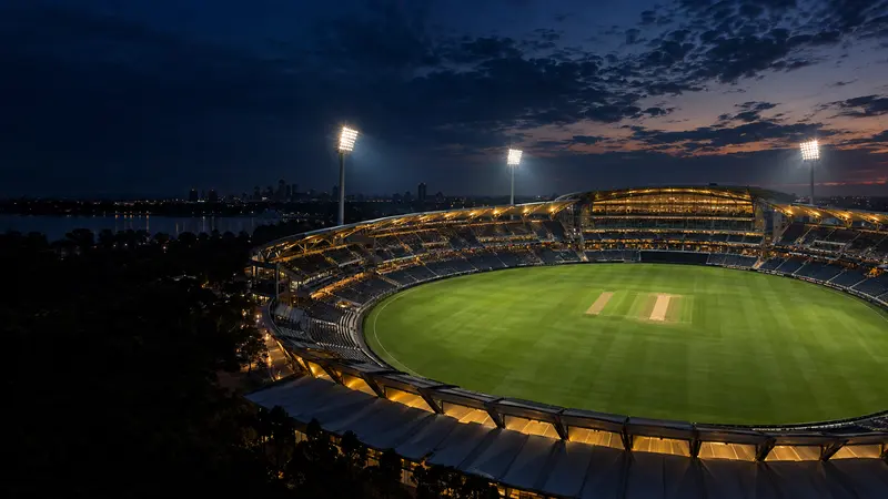 Cricket ground illuminated for an evening match